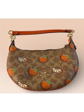 Coach Crescent Shoulder Bag in Brown with Orange Print